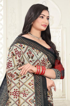 Fashion Max Cream & Grey color combined Patola print saree made of Premium soft silk with checks blouse .