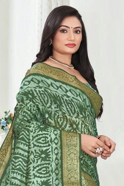 Fashion Max Green Patola print Saree with Wide foil print border & Running blouse .